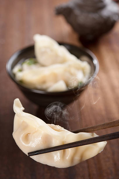 istock Popular Asian dish dumplings soup 491525880