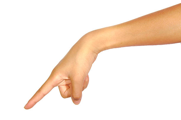 istock Closeup of female hand pointing down isolated on a white 491528574