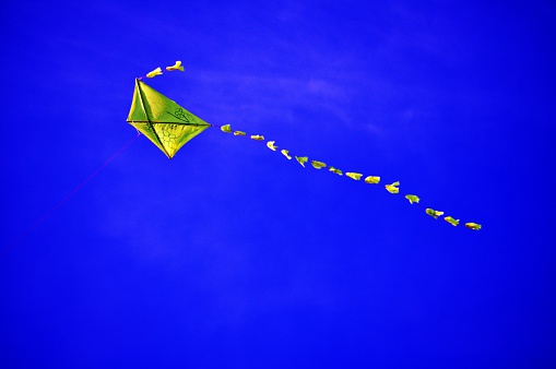 Yellow kite,blue sky