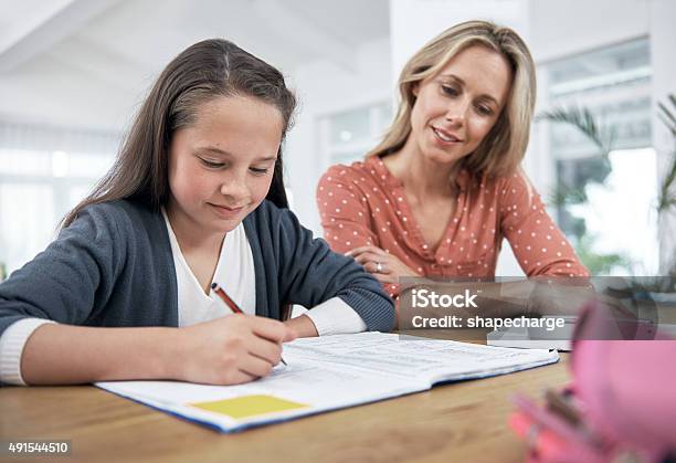 Staying Involved In Her Daughters Education Stock Photo - Download Image Now - 2015, A Helping Hand, Adolescence