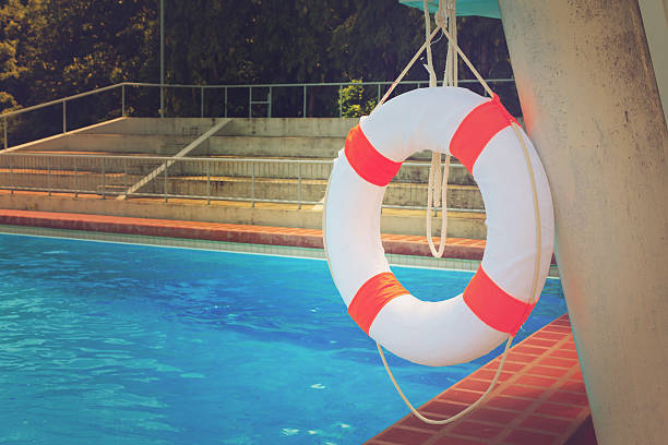 istock Life buoy and swimming pool 491544686