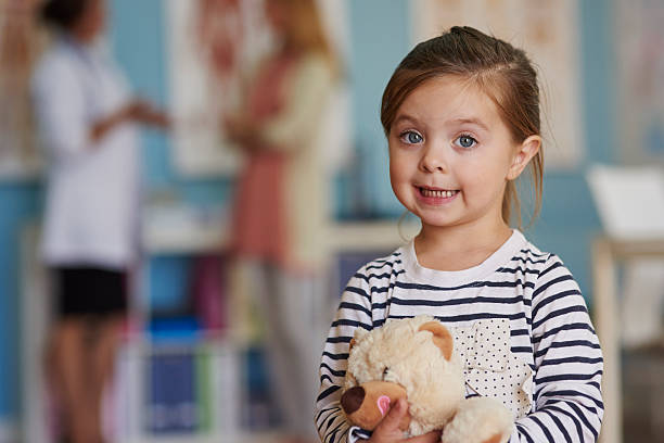 istock Brave girl at the doctors office 491544978