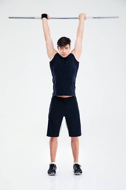 istock Fitness man workout with barbell 491545212