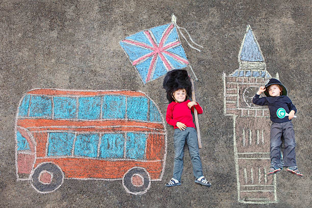 istock Two kid boys in british policeman uniform London picture chalk 491558204