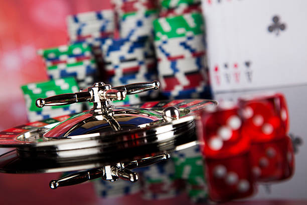 istock Poker Chips on a gaming with casino roulette 491558372