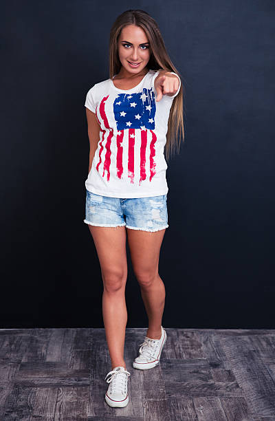 istock Cute girl pointing finger at camera 491560024
