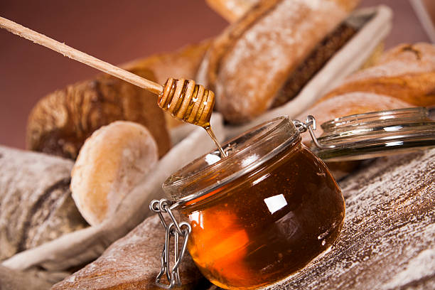 istock Freshly baked traditional bread on wooden table 491562004