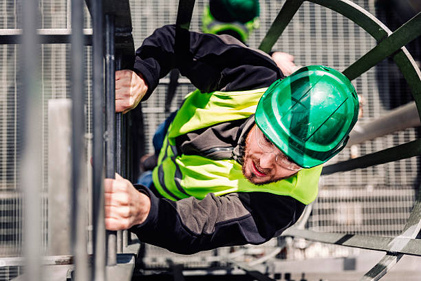 istock Young technician climbing ladder in industry 491563806