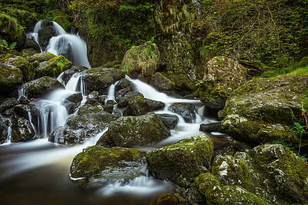Photo of Beautiful Cumbrian Trickling Waterfall With Rocks.