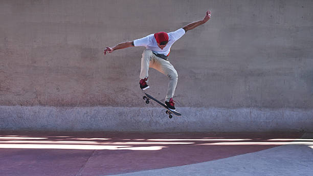 Change requires a leap of faith Shot of a young man doing tricks on his skateboard at the skateparkhttp://195.154.178.81/DATA/i_collage/pu/shoots/805697.jpg skateboard stock pictures, royalty-free photos & images