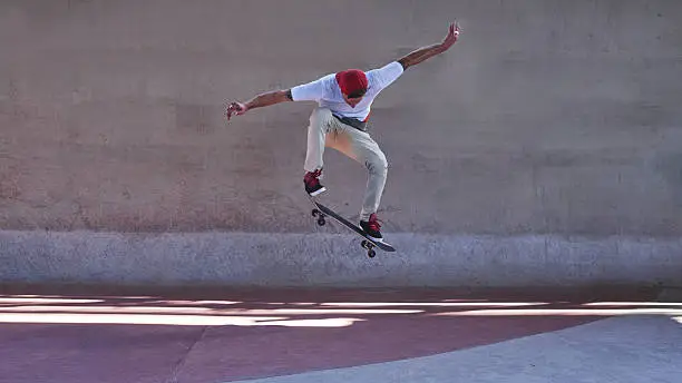 Shot of a young man doing tricks on his skateboard at the skateparkhttp://195.154.178.81/DATA/i_collage/pu/shoots/805697.jpg