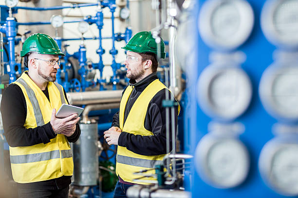 istock Manual workers planning in factory 491574912