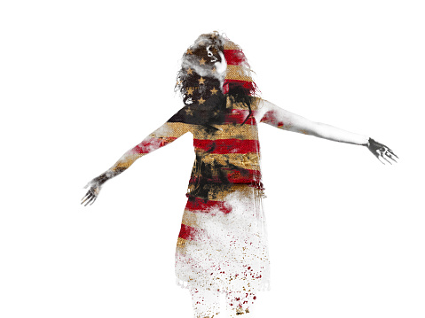 Double exposure of woman's form combined with an American flag filling in her silhouette, isolated on a white background