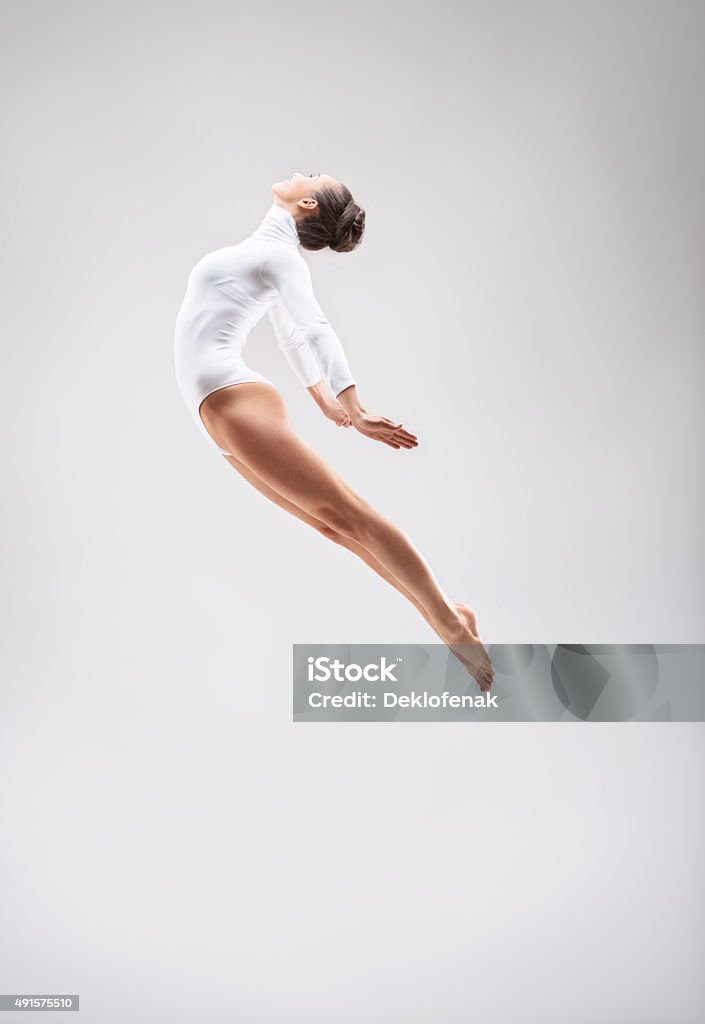 Expression Smiling girl in the studio Flying Stock Photo