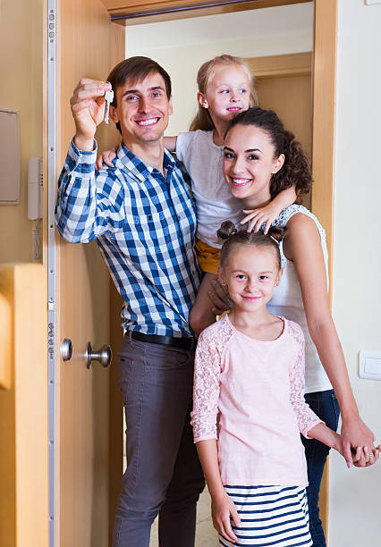 istock Middle class family in new house 491575598