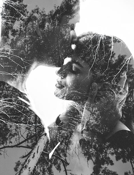 Loving couple image with tree branches in photgraphic effect
