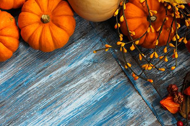 istock Pumpkin Background on wood 491576284