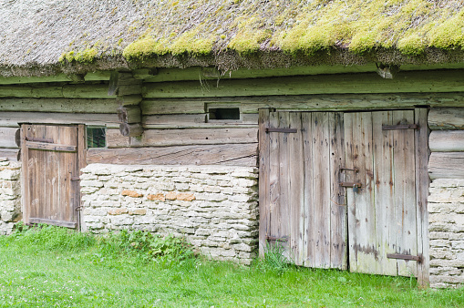 Old barn with thatch and two doors