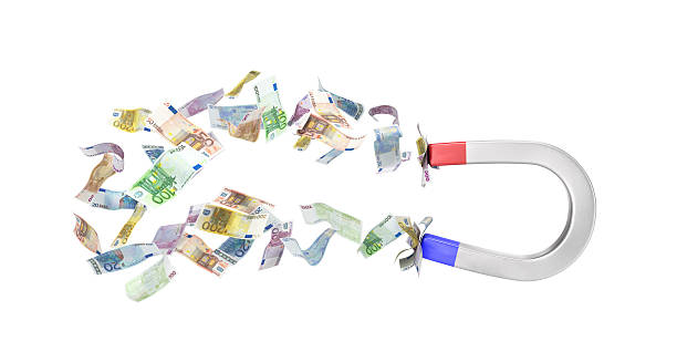 istock Magnet attracts many banknotes and money 491577370