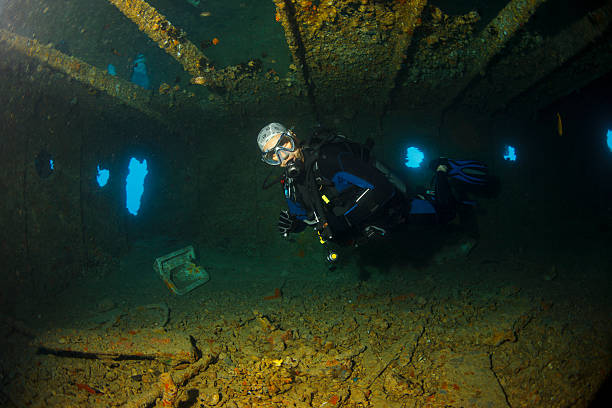 istock Scuba diver  inside shipwreck   WRECK DIVING  Underwater reef  Red Sea 491578094