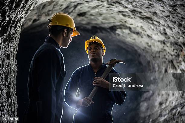 Miners Working At A Mine Stock Photo - Download Image Now - Mining - Natural Resources, Miner, Underground