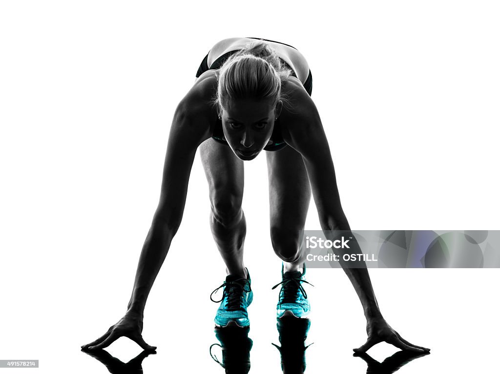 の女性ランナーのランニング、ジョギングランナーシルエット - スタートラインのロイヤリティフリーストックフォト