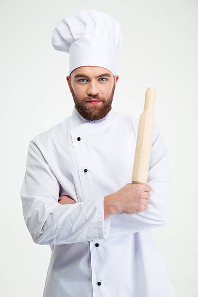 istock Male chef cook holding a rolling pin 491579428