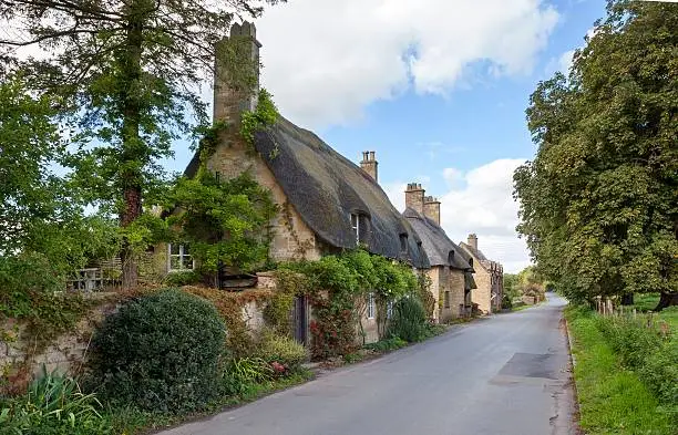 Cotswold thatched cottages near Broadway, Worcestershire, England.