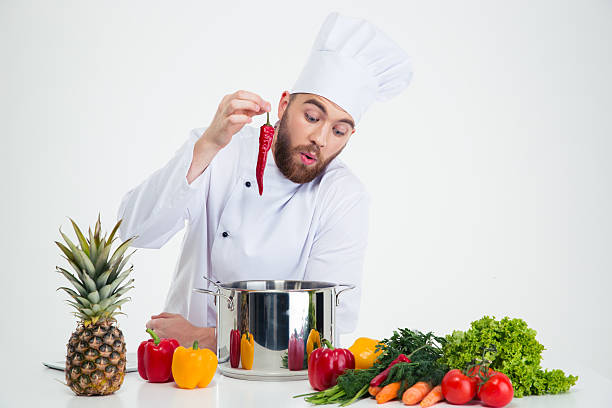 istock Portrait of a young chef cook preparing soup 491581638