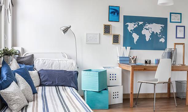 diseñado para macho adolescente - bedroom blue bed domestic room fotografías e imágenes de stock