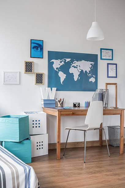 istock Stylish workspace in teen room 491582362