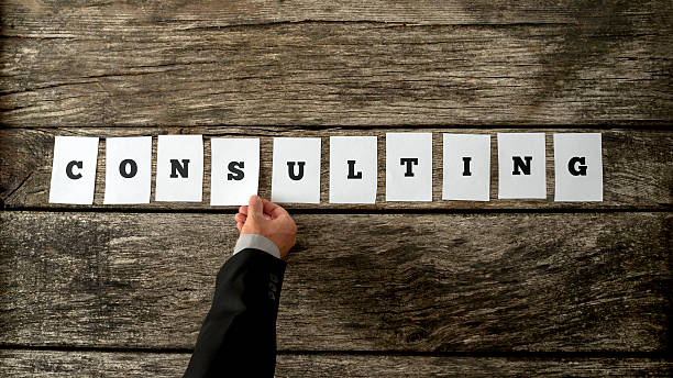 istock Business consultant assembling the word CONSULTING 491599314