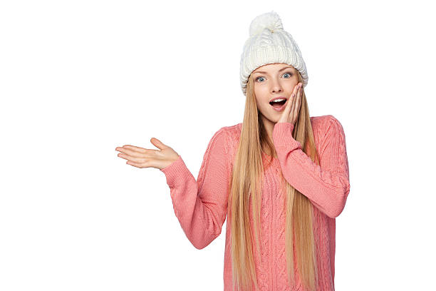 istock Winter woman showing blank copy space 491600366