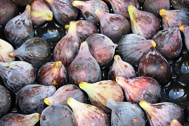 istock Fresh blue figs at local market in Italy 491602040