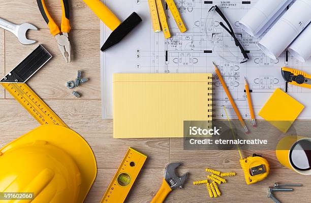 Blueprints And Construction Tools Stock Photo - Download Image Now - Table, Construction Material, Coffee - Drink