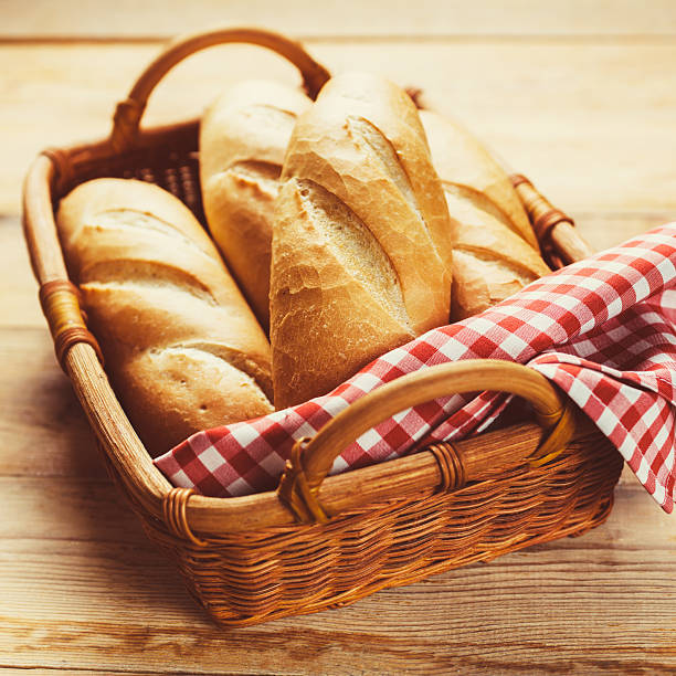 istock Freshly baked bread rolls in a basket 491602448