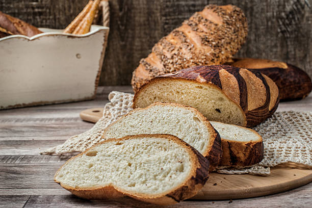 istock Whole wheat bread. Sliced wholegrain loaf of bread 491603744