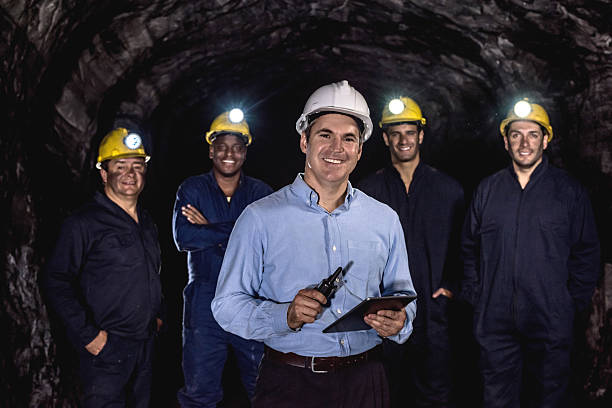istock Engineer leading a group of miners 491603836