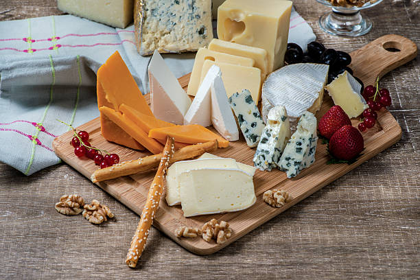 istock Cheese heaven. Cheese Mix Cheese brie, gouda cheese, blue cheese 491603906
