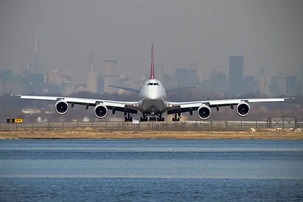 A Boeing 747-800 prepares taxies onto the runway.