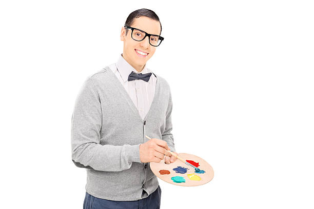 istock Young artist holding paintbrush and a pallet 491606209