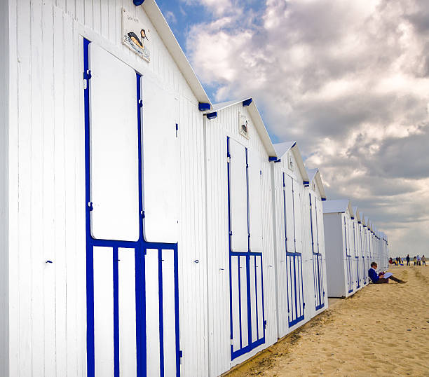 istock White beach cabins in a row on Franch coast 491606493