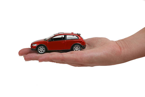 istock car on female hand 491607611