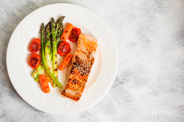 istock Grilled salmon with vegetables 491611851