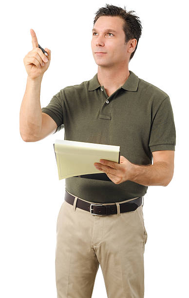 istock Casual Dress Businessman Holding Notepad on White 491614840