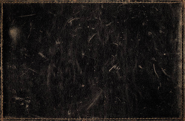 istock Black grunge background from distress leather texture with stitched frame 491615022