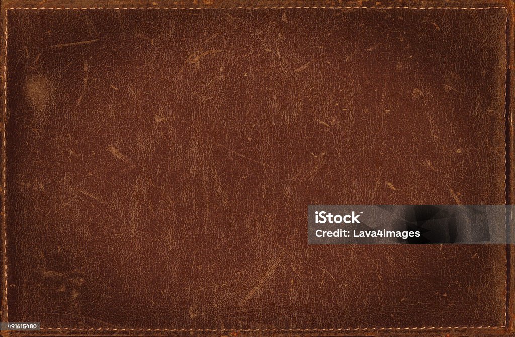 Brown grunge background from distress leather texture with stitched frame Grunge background with hi res leather texture, framework for your content, available in 9 colours. Leather Stock Photo