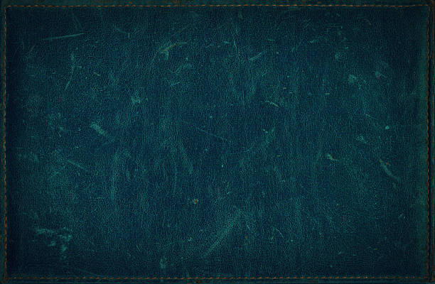 istock Dark blue grunge background from leather texture with stitched frame 491616268