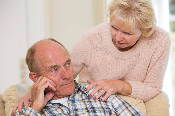 istock Woman Comforting Senior Man With Depression 491617068