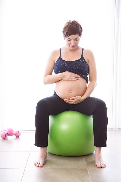 istock Pregnant woman keeping in shape 491619026